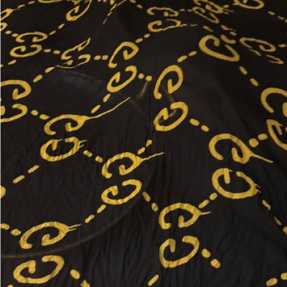 Authentic Gucci Ghost black and yellow 
Shawl Pre-owned good condition no tags